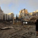 A resident checks the destruction in the aftermath of an Israeli strike on the neighbourhood of Mreijeh in Beirut's southern suburbs on October 4, 2024. - A source close to Hezbollah said Israel had conducted 11 consecutive strikes on the group's south Beirut stronghold late October 3, in one of the most violent raids since Israel intensified its bombardment campaign last week. (Photo by AFP)