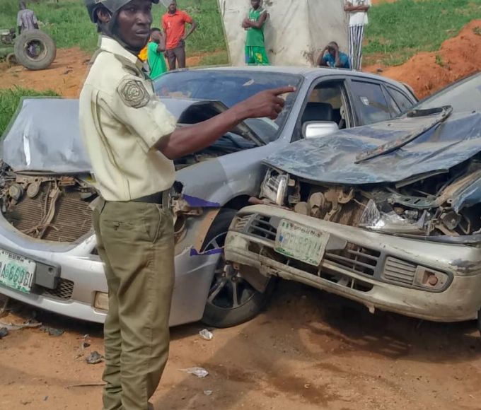 A trace operative with some of the damaged vehicle